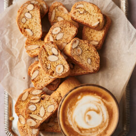 authentic biscotti recipe on a serving table next to a coffee cup