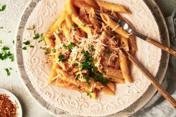 close image of dish with pasta alla vodfka sauce