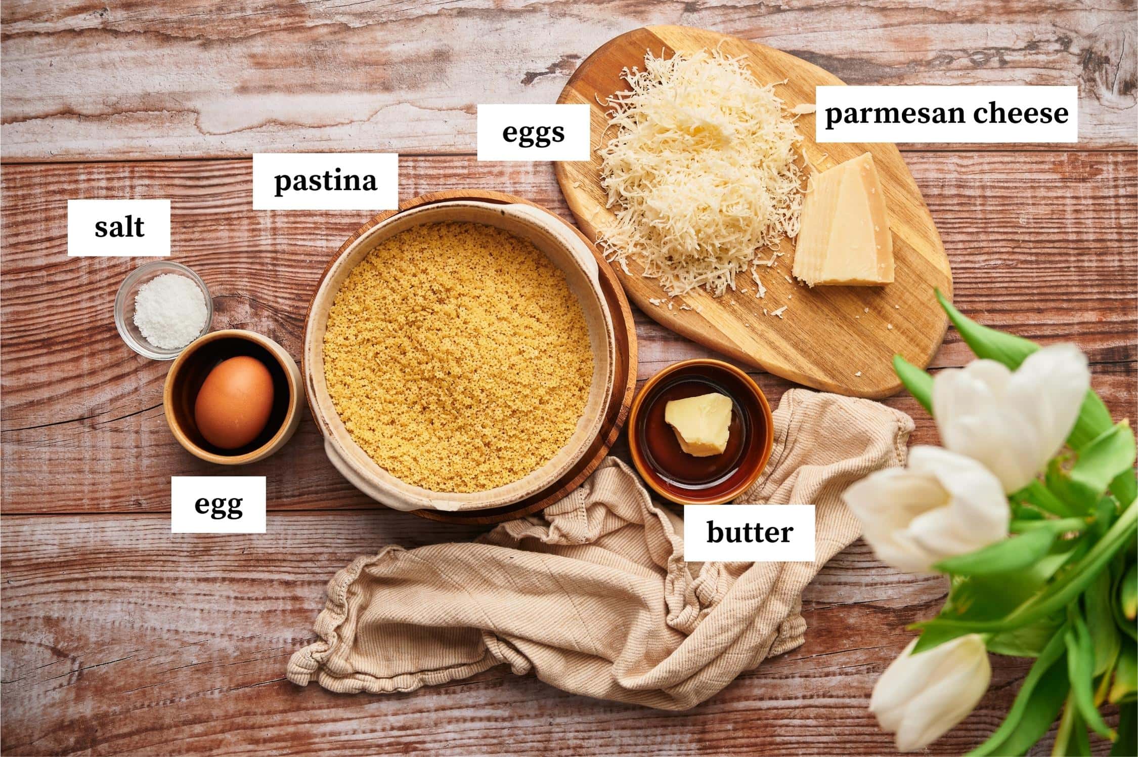 ingredients for cheesy pastina layed on a table