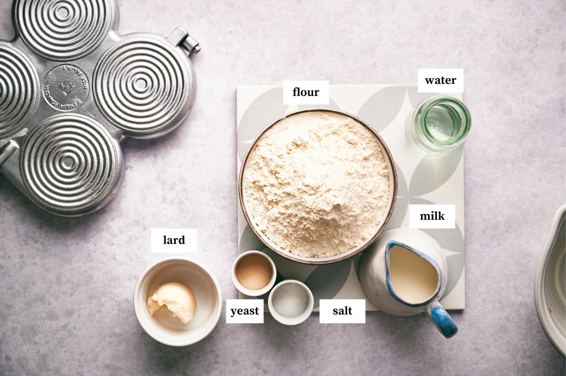 Ingredients for Tigelle Foccaccine Bread: lard, flour, water, milk, salt and yeast. 