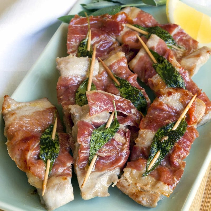 Veal saltimbocca. Traditional saltimbocca recipe with prosciutto and sage